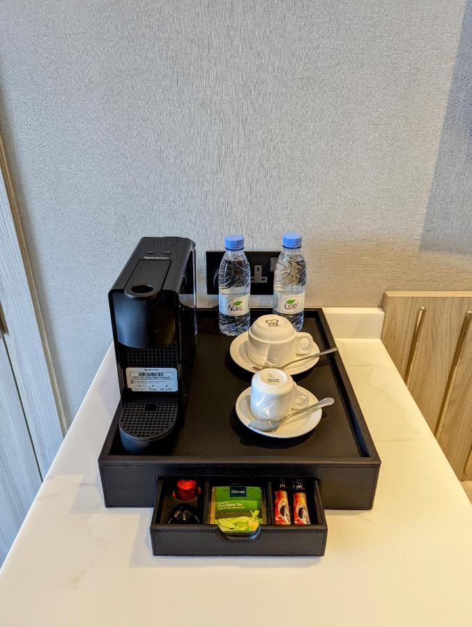 Citadines Abhaアパートホテル エクステリア 写真 A Nespresso coffee machine in a hotel room